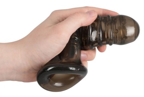 Rebel Nakładka Czarna z Otworem na Jądra i Rowkami 18 cm TPR Rebel Nakładka Czarna z Otworem na Jądra i Rowkami 18 cm TPR